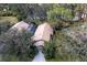 Birds eye view of a home featuring a screened in pool and a tile roof at 4768 Tivoli Ave, Sarasota, FL 34235