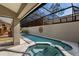 Gorgeous pool and spa area with screened lanai offering both relaxation and fun at 4768 Tivoli Ave, Sarasota, FL 34235