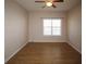 Bright bedroom with neutral walls, laminate flooring, and a window with blinds at 4802 51St W St # 613, Bradenton, FL 34210