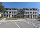 Exterior view of condominiums with screened-in porches and well-maintained landscaping at 4802 51St W St # 613, Bradenton, FL 34210