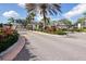 Gated entrance to the community offering security and a welcoming landscaped entry at 4802 51St W St # 613, Bradenton, FL 34210