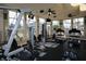 Well-equipped fitness center featuring exercise machines and large windows for natural light at 4802 51St W St # 613, Bradenton, FL 34210