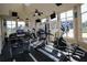 Bright gym with treadmills, elliptical, and weight machines, perfect for a full workout at 4802 51St W St # 613, Bradenton, FL 34210