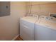 Practical laundry area includes a washer and dryer at 4802 51St W St # 613, Bradenton, FL 34210