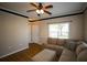 Comfortable living room featuring natural light, wood-look floors, a neutral color scheme, and a cozy sectional sofa at 4802 51St W St # 613, Bradenton, FL 34210