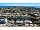 Aerial view of homes along canals with docks, showcasing waterfront living and community layout at 505 65Th St, Holmes Beach, FL 34217