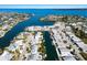 Aerial view of waterfront homes along canals, highlighting the community's access to waterways and boat docks at 505 65Th St, Holmes Beach, FL 34217