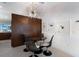 Dining area features a modern chandelier and unique wall art at 505 65Th St, Holmes Beach, FL 34217