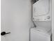 Laundry closet with stacked washer and dryer at 505 65Th St, Holmes Beach, FL 34217