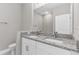 Bathroom with double vanity and granite countertop at 514 Santiguay St, Punta Gorda, FL 33983