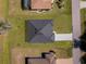 Aerial view of a single-Gathering home with a gray roof and paved driveway at 514 Santiguay St, Punta Gorda, FL 33983