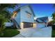 Modern home exterior featuring a clean architectural design, a garage and a well-kept lawn at 515 S Osprey Ave, Sarasota, FL 34236