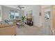 Inviting living room with a comfortable sectional sofa, ceiling fan, and a view of the outdoors at 515 S Osprey Ave, Sarasota, FL 34236