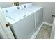 A well-equipped laundry room featuring a washer and dryer for convenient laundry care at 5251 Mahogany Run Ave # 526, Sarasota, FL 34241