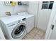 Convenient laundry room equipped with modern LG washer and dryer appliances at 5276 Mahogany Run Ave, Sarasota, FL 34241