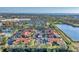 An aerial view of the residential community, showcasing its layout and proximity to a lake at 5400 34Th W St # A17, Bradenton, FL 34210