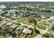 Wide aerial view of a property, near a lake, that showcases the lot's boundaries at 5630 Saint Louis Ave, Sarasota, FL 34233