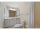 Well-maintained bathroom with vanity, mirror, and shower-tub combo at 5630 Saint Louis Ave, Sarasota, FL 34233