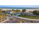 Beach pavillion with grassy area, sidewalk, and easy beach access for residents at 5630 Saint Louis Ave, Sarasota, FL 34233