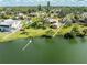 Aerial view of home highlighting waterfront property with backyard access to water at 5630 Saint Louis Ave, Sarasota, FL 34233