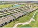 Aerial view of community with pool and golf course at 5721 Palmer Cir # 205, Lakewood Ranch, FL 34211