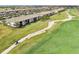 Aerial view of condo building and golf course at 5721 Palmer Cir # 205, Lakewood Ranch, FL 34211