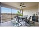 Balcony with outdoor dining set and golf course view at 5721 Palmer Cir # 205, Lakewood Ranch, FL 34211