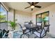 Balcony with outdoor dining set and partial kitchen view at 5721 Palmer Cir # 205, Lakewood Ranch, FL 34211