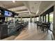 Modern bar with comfortable seating and large screen TVs at 5721 Palmer Cir # 205, Lakewood Ranch, FL 34211