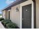 Private condo entrance with landscaping at 5721 Palmer Cir # 205, Lakewood Ranch, FL 34211