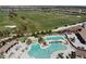 Large resort-style pool with a relaxing waterscape at 5721 Palmer Cir # 205, Lakewood Ranch, FL 34211