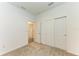 Spacious bedroom with neutral carpeting and double door closet at 5866 Bungalow Grove Ct, Palmetto, FL 34221