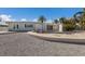 Backyard featuring an empty brick-bordered pool, and patio at 627 Dundee Ln, Holmes Beach, FL 34217