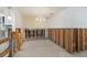 Dining area featuring tile floors and chandelier lighting at 627 Dundee Ln, Holmes Beach, FL 34217