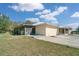 Exterior angle of home with screened in porch at 6521 121 St E Ave, Parrish, FL 34219