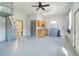 Garage featuring a loft, sink, and cabinetry at 6521 121 St E Ave, Parrish, FL 34219