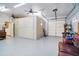 Garage includes space for working with a door, and an open area for parking or storage at 6521 121 St E Ave, Parrish, FL 34219