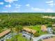 Aerial view showing building's location and surroundings at 7 Quails Run Blvd # 9, Englewood, FL 34223