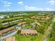 Aerial view of building location and neighborhood at 7 Quails Run Blvd # 9, Englewood, FL 34223