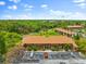 Aerial view showcasing building and parking at 7 Quails Run Blvd # 9, Englewood, FL 34223