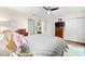 Bright bedroom with a comfortable bed and plenty of closet space at 7 Quails Run Blvd # 9, Englewood, FL 34223