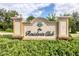 Welcoming entrance sign of The Residents Club nestled in lush greenery, creating a warm and inviting atmosphere at 7103 Westhill Ct, Lakewood Ranch, FL 34202