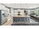 Modern kitchen with stainless steel appliances and island at 7812 Birdie Bend Way, Sarasota, FL 34241