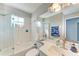 Clean bathroom with white tile and updated vanity at 803 Montrose Dr # 201, Venice, FL 34293