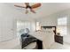 Bright bedroom with sliding door access to a balcony at 803 Montrose Dr # 201, Venice, FL 34293