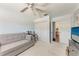 Bedroom with sofa bed and access to kitchen at 803 Montrose Dr # 201, Venice, FL 34293