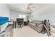 Bedroom with desk, sofa bed, and ample natural light at 803 Montrose Dr # 201, Venice, FL 34293