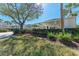 Condo with covered parking and lush landscaping at 803 Montrose Dr # 201, Venice, FL 34293