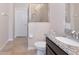 Bathroom featuring a toilet, walk-in shower and granite vanity at 8362 Enclave Way # 103, Sarasota, FL 34243