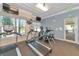 Fitness center featuring modern equipment, including treadmills and elliptical machines at 8362 Enclave Way # 103, Sarasota, FL 34243